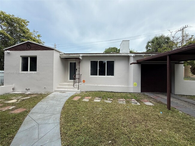 586 NW 48th St in Miami, FL - Foto de edificio - Building Photo