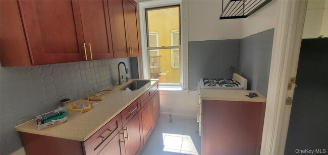 property at 32-55-55 Steinway St