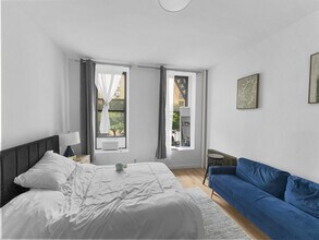 51 E Houston St-Unit -ID1015772P in New York, NY - Building Photo - Building Photo