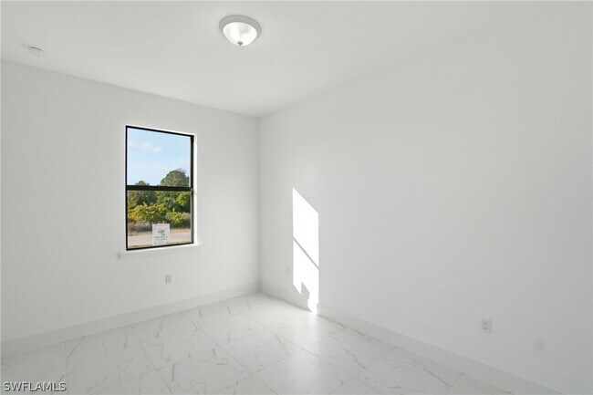 2404-2406 Mae Ave S in Lehigh Acres, FL - Building Photo - Building Photo