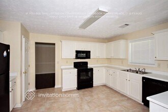 6521 Carriage Ln in Stone Mountain, GA - Building Photo - Building Photo