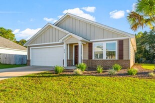 698 Whispering Creek Ave in Freeport, FL - Building Photo