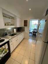 10210 Collins Ave in Bal Harbour, FL - Building Photo - Building Photo