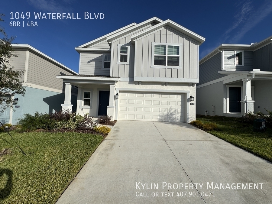 1049 Waterfall Blvd in Davenport, FL - Building Photo