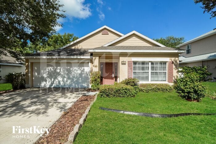 1242 Longville Cir in Tavares, FL - Building Photo