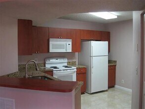 8781 Wiles Rd, Unit 203 in Coral Springs, FL - Building Photo - Building Photo