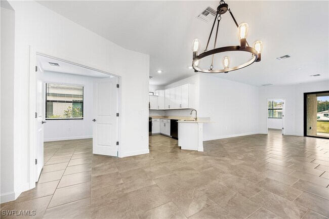 19597 Hinkley Dr in Estero, FL - Building Photo - Building Photo