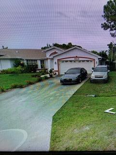 4921 NW Manville Dr in Port St. Lucie, FL - Building Photo