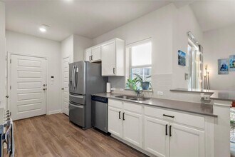 8000 Mellencamp Dr in Austin, TX - Building Photo - Building Photo