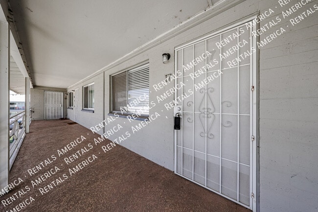 property at 6841 E 2nd St