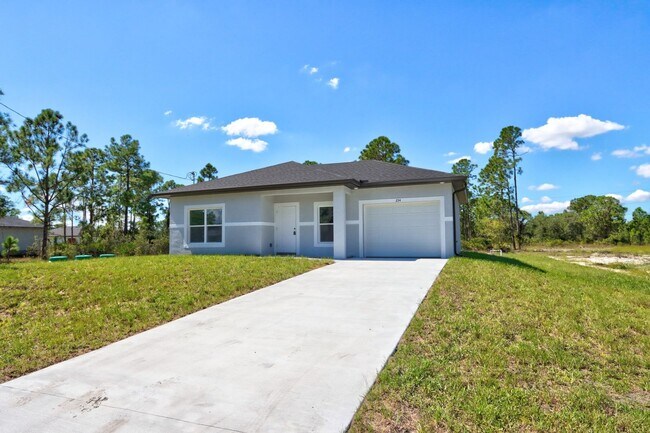 234 Narcissus Ave S in Lehigh Acres, FL - Building Photo - Building Photo
