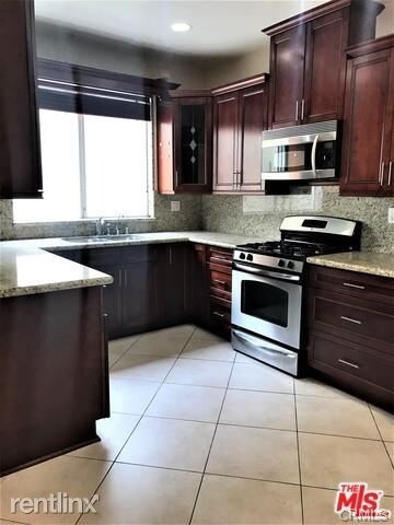 10630 Wilkins Ave-Unit -Apt 102 in Los Angeles, CA - Building Photo - Building Photo