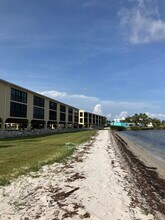 14459 River Beach Dr, Unit D225 in Port Charlotte, FL - Building Photo - Building Photo