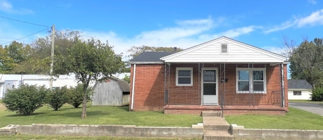 property at 115 E 5th St