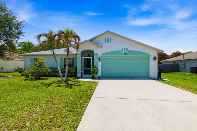 property at 1838 SE Genaro Terrace