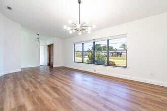 2381 SE Aneci St in Port St. Lucie, FL - Building Photo - Building Photo