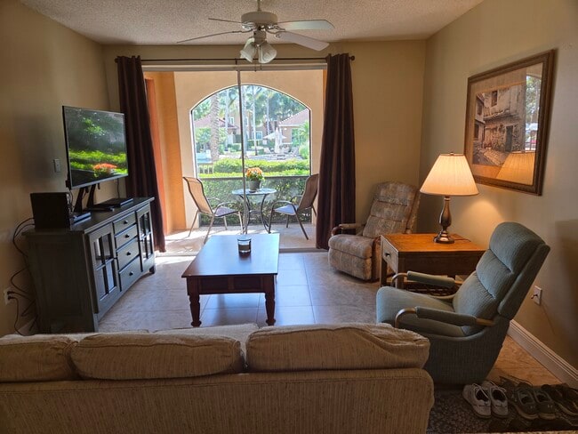 1235 Reserve Way, Unit 104 in Naples, FL - Foto de edificio - Building Photo