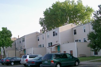 Torre De San Miguel Homes in St. Paul, MN - Building Photo - Building Photo