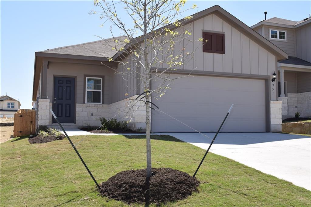 951 Pepperbark Loop in Mustang Ridge, TX - Building Photo