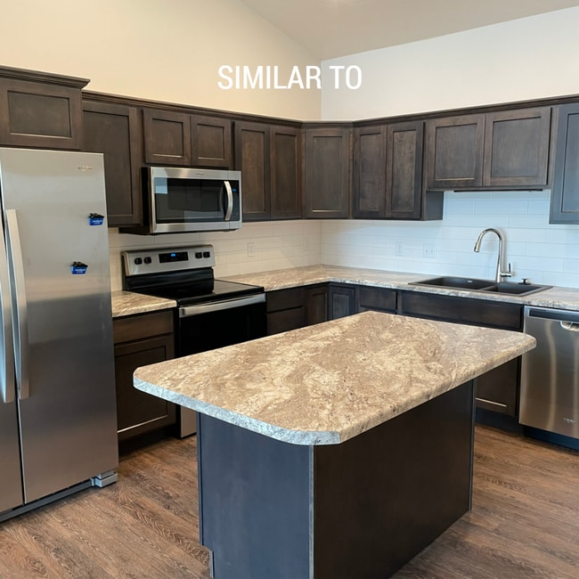 5411 S Huntwood Ave in Sioux Falls, SD - Foto de edificio - Building Photo