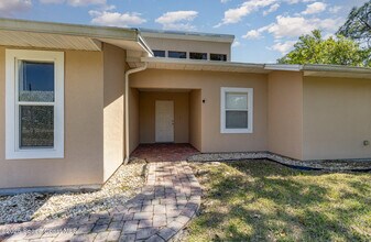 1399 Tilberg Ave NW in Palm Bay, FL - Building Photo - Building Photo