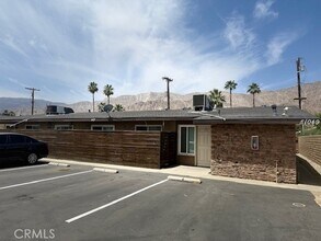 51099 Eisenhower Dr, Unit 1 in La Quinta, CA - Building Photo - Building Photo