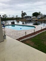 12517 1st Is, Unit Unit 3 in Hudson, FL - Building Photo