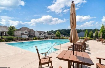 7725 Farrow Pass Cir in Cumming, GA - Building Photo - Building Photo
