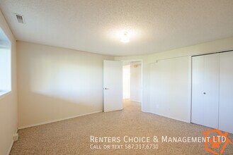 Pet Friendly Condo, Utilities Included, Laundry In Unit in Lethbridge, AB - Building Photo - Building Photo