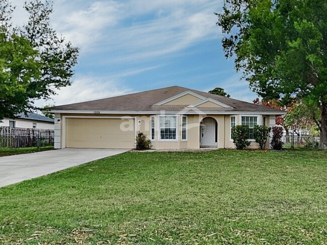 property at 1009 SW Alcantarra Blvd