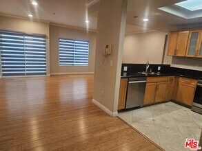 1128 S Serrano Ave in Los Angeles, CA - Building Photo - Building Photo