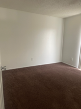 11222 Chamberlaine Way-Unit -9 in Adelanto, CA - Building Photo - Building Photo
