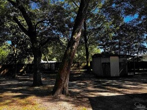 7740 Poinciana Pl in Milton, FL - Building Photo - Building Photo