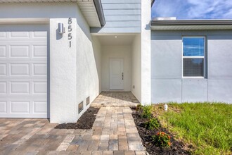 8551 Dinnano St in Port Charlotte, FL - Building Photo - Building Photo