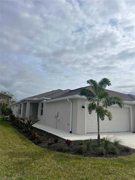 9099 Leatherwood Loop in Lehigh Acres, FL - Building Photo - Building Photo