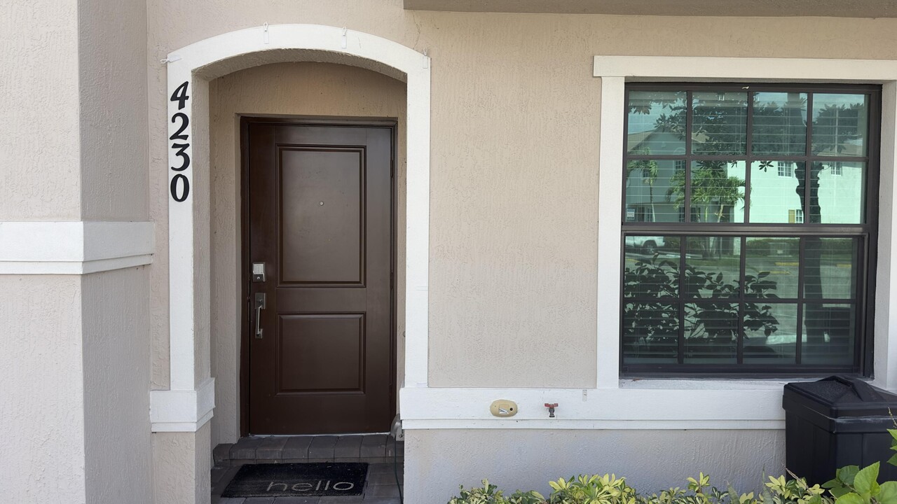 4230 Napoli Lake Dr in Riviera Beach, FL - Building Photo