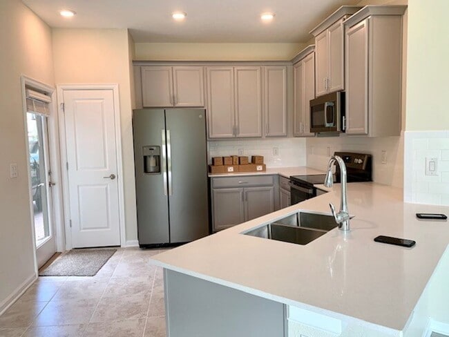 1302 SHINNECOCK HILLS Dr in Champions Gate, FL - Building Photo - Building Photo