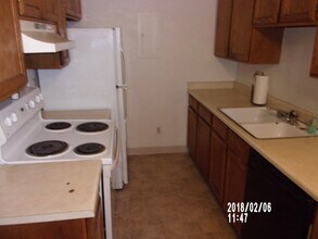 14852 E Kentucky Dr in Aurora, CO - Building Photo - Building Photo