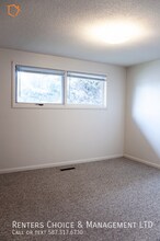 2 Bedroom, Assigned Parking, Onsite Laundry in Lethbridge, AB - Building Photo - Building Photo