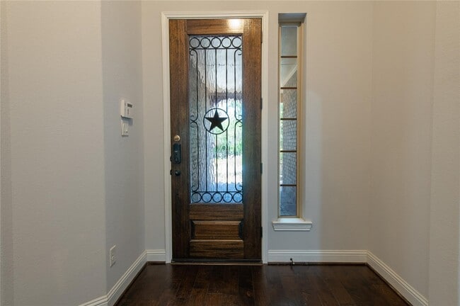 7 Whispering Thicket Pl in Tomball, TX - Building Photo - Building Photo
