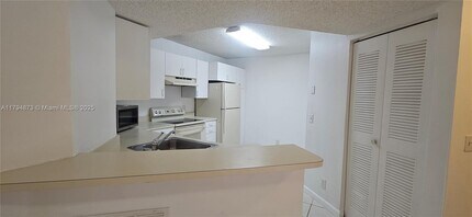 9001 Wiles Rd in Coral Springs, FL - Building Photo - Building Photo