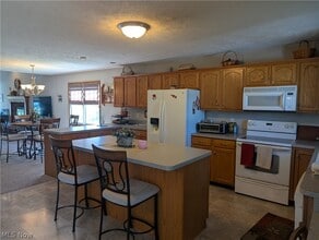 15070 Woodsong Dr in Middlefield, OH - Building Photo - Building Photo