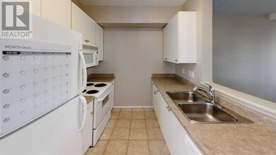 7202-7105 105 St in Grande Prairie, AB - Building Photo - Building Photo
