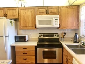 170 Turtle Lake Ct in Naples, FL - Building Photo - Building Photo