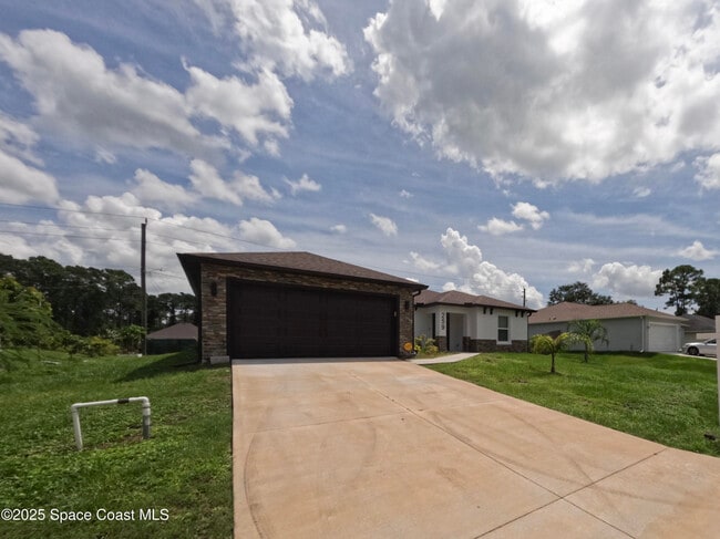 259 Wilton Ave SW in Palm Bay, FL - Building Photo - Building Photo