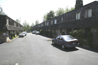 Multnomah Village Townhomes in Portland, OR - Building Photo - Building Photo