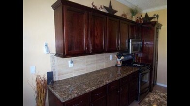 1242 Olympic Cir in Greenacres, FL - Building Photo - Building Photo
