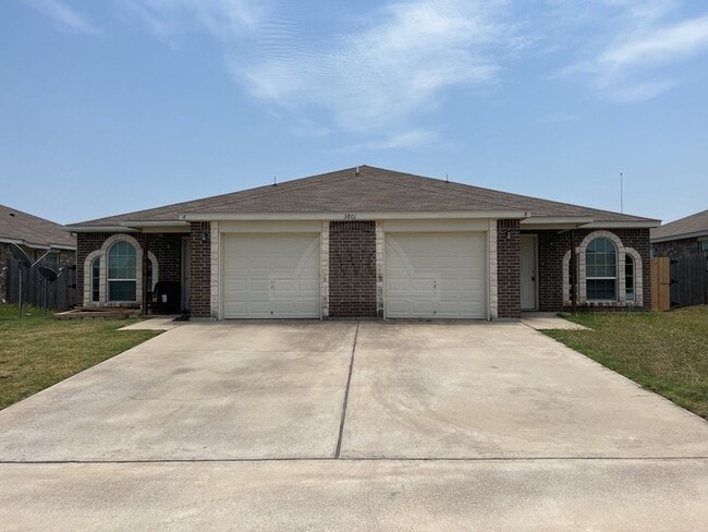 property at 3801 John Chisholm Loop