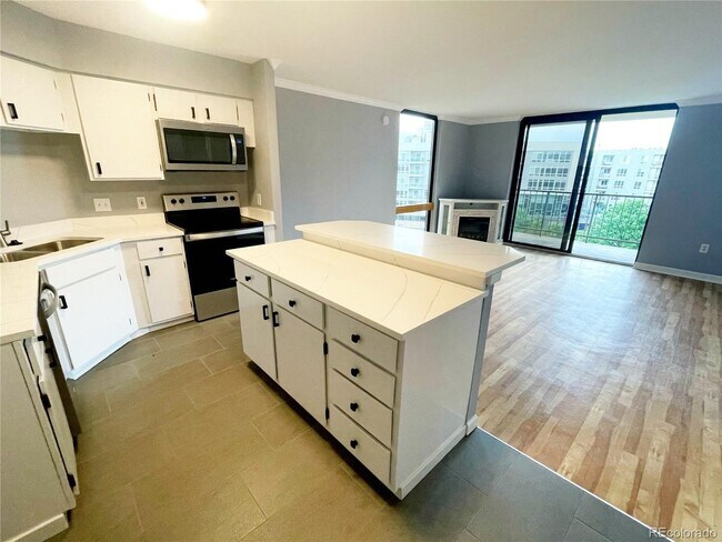 1301 Speer Blvd, Unit 606 in Denver, CO - Building Photo - Building Photo