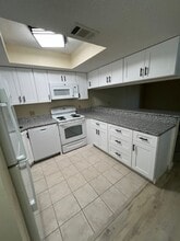 1515 Forrest Nelson Blvd, Unit O103 in Port Charlotte, FL - Building Photo - Building Photo